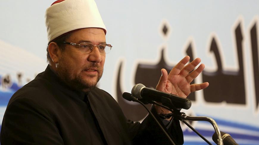Awqaf Minister Mohamed Mokhtar Gomaa speaks during a conference held by the Awqaf (Religious Affairs) Ministry headquarters in Cairo, May 25, 2015, to discuss the renewal of religious discourse, a proposal by President Abdel Fattah al-Sisi in hopes to confront the extremism that has swept the region in recent years. REUTERS/Mohamed Abd El Ghany - RTX1EH3I