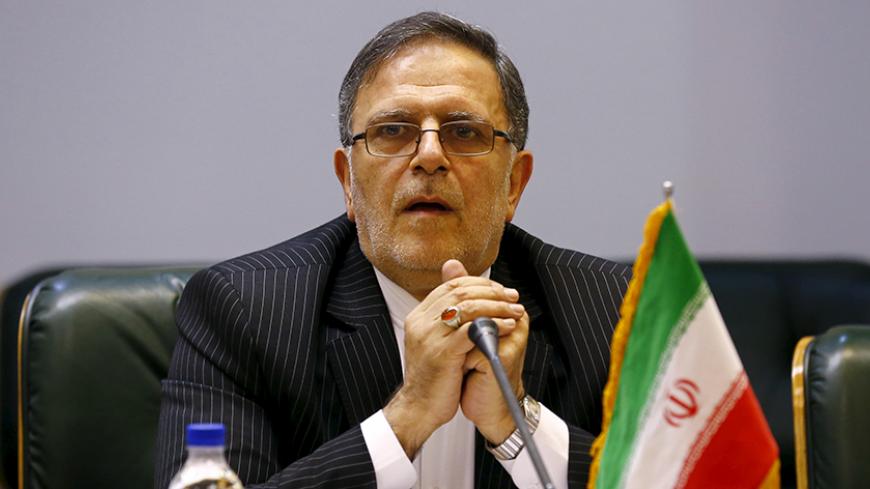Valiollah Seif, Governor of Central Bank of Iran, waits to start a meeting with Britain's Foreign Secretary Philip Hammond (unseen) in Tehran, Iran August 23, 2015. REUTERS/Darren Staples - RTX1PBAT