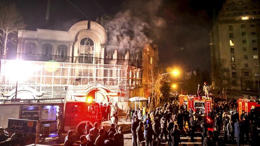 Flames rise from Saudi Arabia's embassy during a demonstration in Tehran January 2, 2016. Iranian protesters stormed the Saudi Embassy in Tehran early on Sunday morning as Shi'ite Muslim Iran reacted with fury to Saudi Arabia's execution of a prominent Shi'ite cleric. REUTERS/TIMA/Mehdi Ghasemi/ISNA ATTENTION EDITORS - THIS PICTURE WAS PROVIDED BY A THIRD PARTY. REUTERS IS UNABLE TO INDEPENDENTLY VERIFY THE AUTHENTICITY, CONTENT, LOCATION OR DATE OF THIS IMAGE. FOR EDITORIAL USE ONLY. NOT FOR SALE FOR MARKE