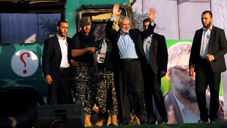 Palestinian Hamas leader in Gaza Ismail Haniyeh waves to his supporters during an anti-Israeli rally in Gaza city April 28, 2016.  REUTERS/Suhaib Salem       - RTX2C2YQ