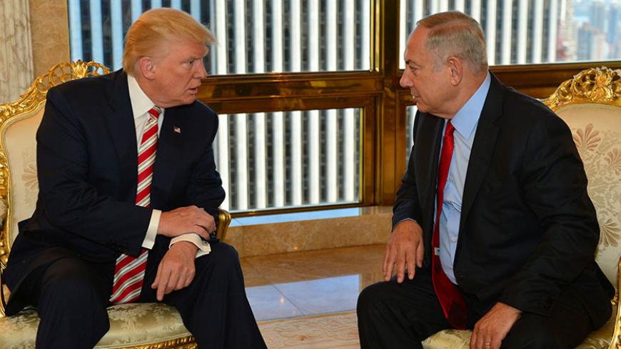 Israeli Prime Minister Benjamin Netanyahu (R) speaks to Republican U.S. presidential candidate Donald Trump during their meeting in New York, September 25, 2016. Kobi Gideon/Government Press Office (GPO)/Handout via REUTERS       ATTENTION EDITORS - THIS IMAGE HAS BEEN SUPPLIED BY A THIRD PARTY. FOR EDITORIAL USE ONLY. - RTX2SIOS