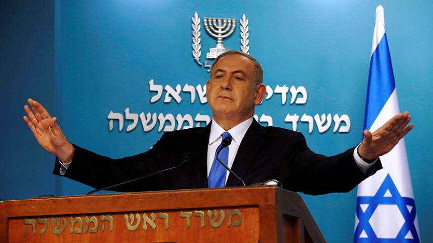 Israeli Prime Minister Benjamin Netanyahu delivers a speech in his Jerusalem office December 28, 2016. REUTERS/Baz Ratner     TPX IMAGES OF THE DAY - RTX2WRPD