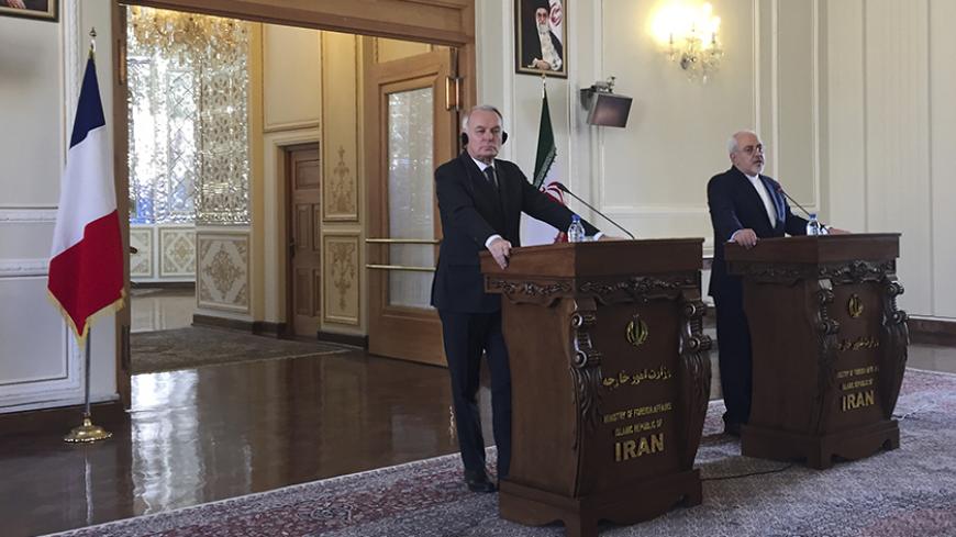 French Foreign Minister Jean-Marc Ayrault (L) and Iranian Foreign Minister Mohammad Javad Zarif (R) attend a news conference in Tehran, Iran, January 31, 2017.  REUTERS/John Irish  - RTX2YZ8H