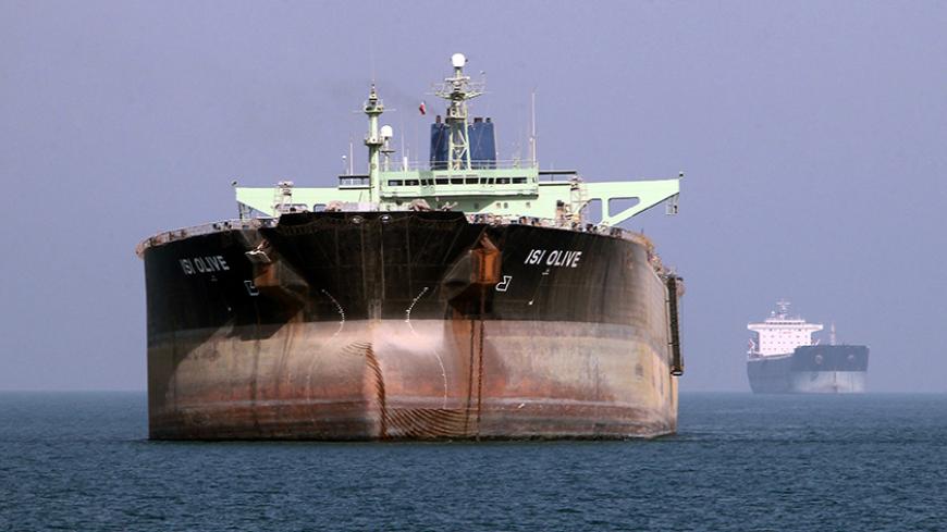 An oil tanker is seen off the port of Bandar Abbas, southern Iran, on July 2, 2012. Iran has come up with several methods to foil the European insurance embargo on ships loaded with its crude, a sanction which may harm its vital exports as much as the EU oil embargo itself. AFP PHOTO/ATTA KENARE        (Photo credit should read ATTA KENARE/AFP/GettyImages)