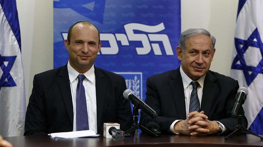 Israeli Prime Minister Benjamin Netanyahu (R) and the head of the right-wing Jewish Home party, Naftali Bennett give a press conference at the Knesset in Jerusalem, on May 6, 2015, to announce the formation of a coalition government. Just ahead of the midnight deadline, Netanyahu managed to put together a narrow majority coalition, comprising his rightwing Likud party with centre-right Kulanu, far-right national-religious Jewish Home and two ultra-Orthodox parties, United Torah Judaism (UTJ) and Shas.