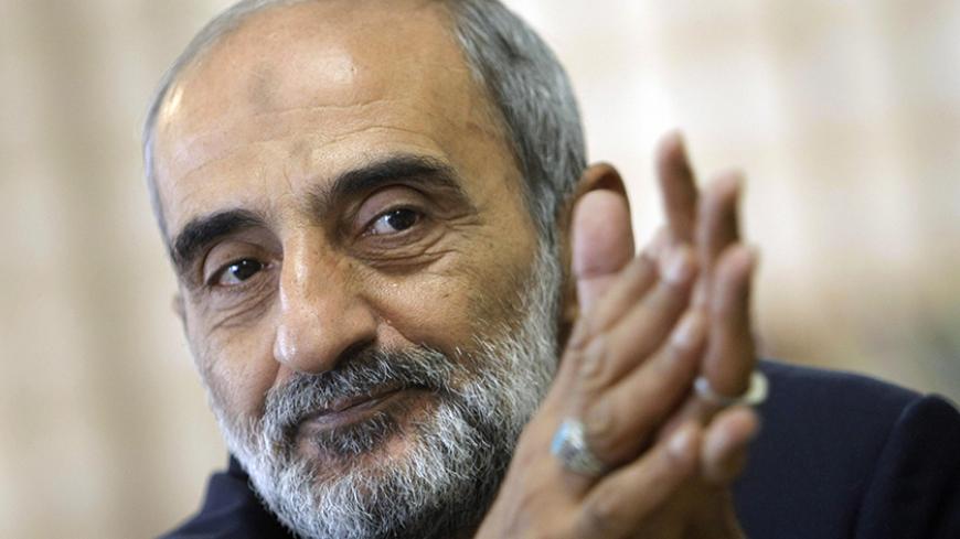 TO GO WITH AFP STORY BY STUART WILLIAMS  Iranian Hossein Shariatmadari, director of the hardline Kayhan (Universe) newspaper group for the past 15 years, looks on during an interview with AFP at his office in Tehran, 16 September 2007. Ridiculing the latest US threats against Tehran and advocating the need to expose traitors, Shariatmadari remains one of the most ardent champions of Iran's Islamic system. Appointed by supreme leader Ayatollah Ali Khamenei himself, few in Iran can match Shariatmadari's autho