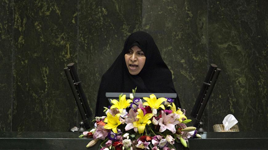EDITORS' NOTE: Reuters and other foreign media are subject to Iranian restrictions on their ability to film or take pictures in Tehran.

Nominee for Health Minister Marzieh Vahid-Dastjerdi speaks to lawmakers in parliament in Tehran September 1, 2009. REUTERS/Morteza Nikoubazl (IRAN POLITICS) - RTR27BK4