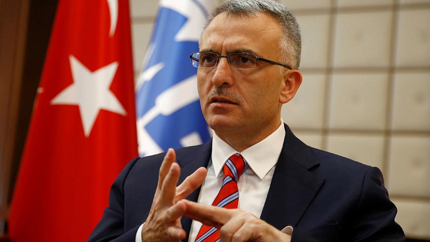 Turkey's Finance Minister Naci Agbal speaks during an interview with Reuters in Ankara, Turkey, September 27, 2016. Picture taken September 27, 2016. REUTERS/Umit Bektas - RTSPSH5