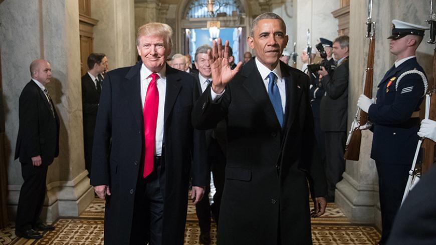 President-elect Donald Trump, left, and President Barack Obama arrive for Trump's inauguration ceremony at the Capitol in Washington, D.C., U.S. January 20, 2017. REUTERS/J. Scott Applewhite/Pool - RTSWJEB