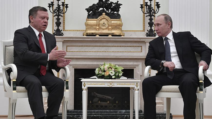 Russian President Vladimir Putin meets with Jordan's King Abdullah at the Kremlin in Moscow, Russia January 25, 2017. REUTERS/Alexander Nemenov/Pool - RTSXBNR
