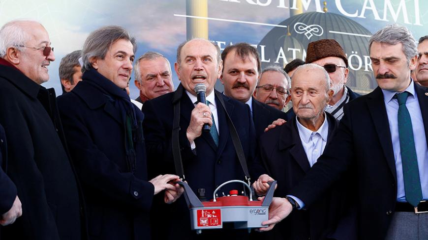 Istanbul's Mayor Kadir Topbas (C) delivers a speech during the groundbreaking ceremony of Taksim mosque in Istanbul, Turkey, February 17, 2017. REUTERS/Osman Orsal - RTSZ48V