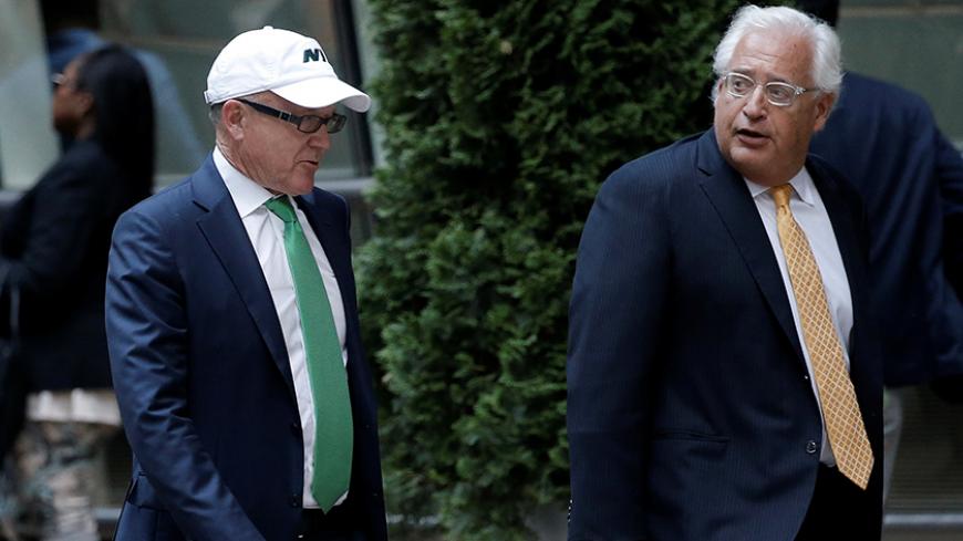 Attorney David Friedman (R) walks with U.S. businessman Robert Wood "Woody" Johnson as they arrive at a private fundraiser for then-Republican presidential candidate Donald Trump in the Manhattan borough of New York City, June 21, 2016. Friedman is U.S. President-elect Donald Trump's designated Ambassador to Israel. Picture taken June 21, 2016.  REUTERS/Mike Segar - RTX2XAMV