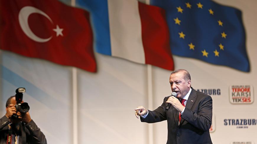 Turkey's President Recep Tayyip Erdogan delivers a speech during a rally against terrorism in Strasbourg, France, October 4, 2015. Some 30000 supporters coming from several countries including France, Germany, and Switzerland gathered in Strasbourg on Sunday to listen to Turkish President Erdogan's address. REUTERS/Vincent Kessler - RTS2Z0D