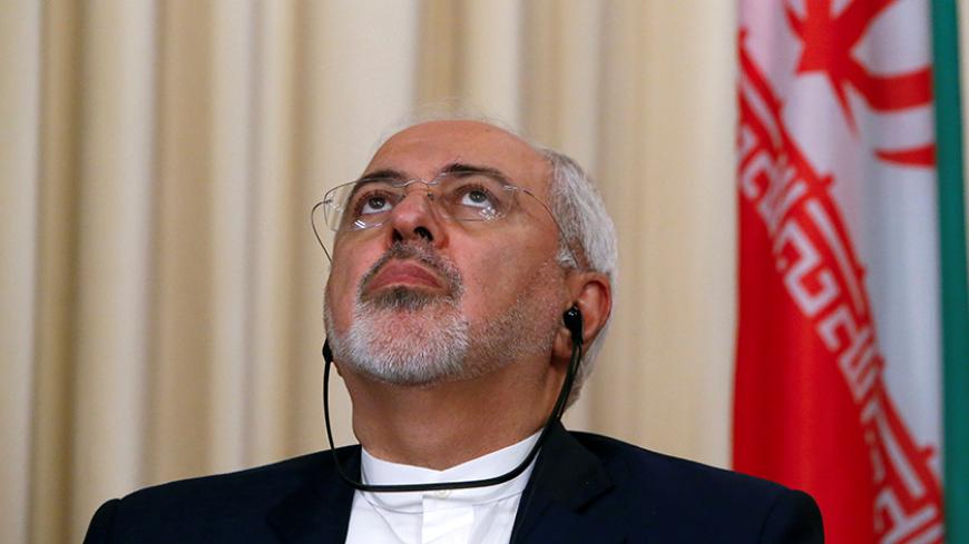 Iranian Foreign Minister Mohammad Javad Zarif attends a news conference after a meeting with his counterparts Walid al-Muallem from Syria and Sergei Lavrov from Russia in Moscow, Russia, October 28, 2016. REUTERS/Sergei Karpukhin - RTX2QU7H