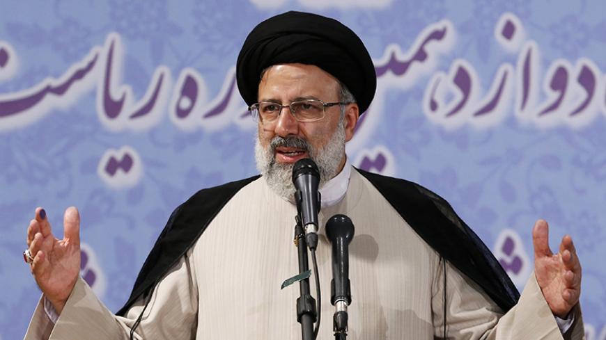 Iranian cleric and head of the Imam Reza charitable foundation, Ebrahim Raisi, delivers a speech after registering his candidacy for the upcoming presidential elections in the capital Tehran on April 14, 2017. / AFP PHOTO / ATTA KENARE        (Photo credit should read ATTA KENARE/AFP/Getty Images)