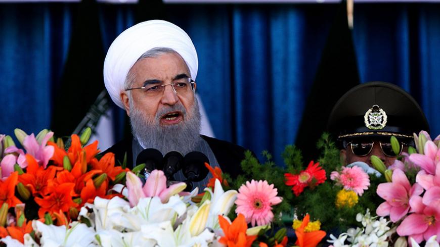 Iranian President Hassan Rouhani delivers a speech during a parade on the occasion of the country's Army Day, on April 18, 2017, in Tehran. / AFP PHOTO / ATTA KENARE        (Photo credit should read ATTA KENARE/AFP/Getty Images)