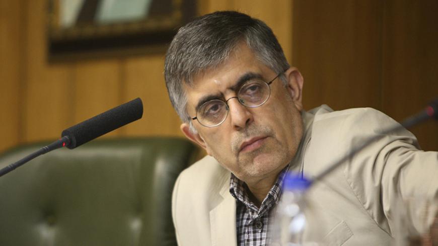 Former Tehran mayor Gholamhossein Karbaschi listens to Mehdi Karroubi, Iranian reformist presidential candidate and former parliament speaker, (not seen) during a press conference in Tehran on May 25, 2009. Karroubi, a 72-year-old cleric who has been dubbed the sheikh of reforms, is challenging President Mahmoud Ahmadinejad, ex-premier Mir Hossein Mousavi and former Revolutionary Guards head Mohsen Rezai in the June 12 presidential poll. AFP PHOTO/ATTA KENARE (Photo credit should read ATTA KENARE/AFP/Getty 