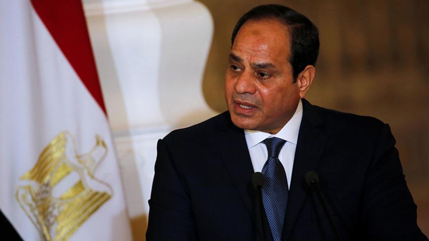 Egypt's President Abdel Fattah al-Sisi speaks during a news conference with German Chancellor Angela Merkel (unseen) at the El-Thadiya presidential palace in Cairo, Egypt, March 2, 2017. REUTERS/Amr Abdallah Dalsh - RTS1162B