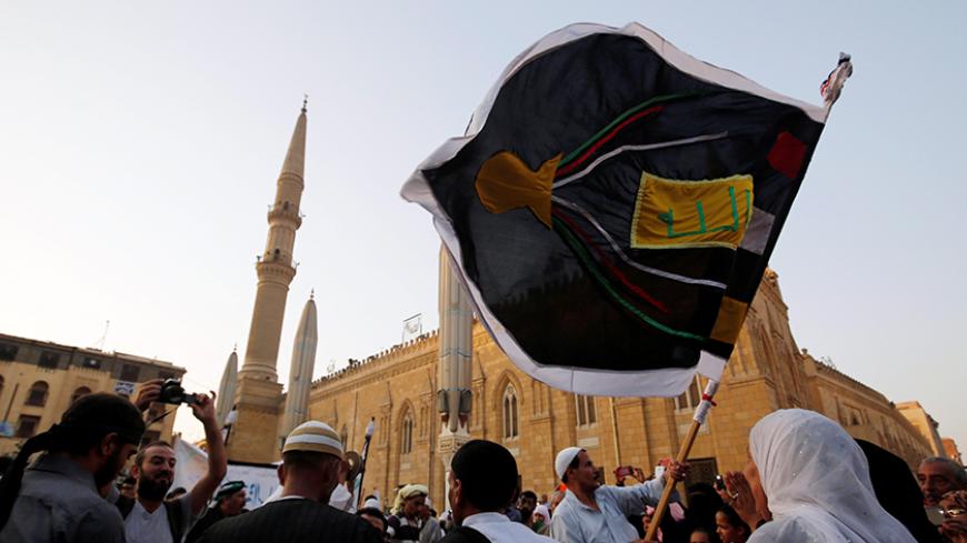 Egyptian Sufi Muslims practice ritualized Zikr (invocation) to celebrate the New Islamic Hijri year 1438 in front of al-Hussein mosque at Al-Azhar district in old Islamic Cairo, Egypt October 2, 2016. REUTERS/Amr Abdallah Dalsh - RTSQGCU