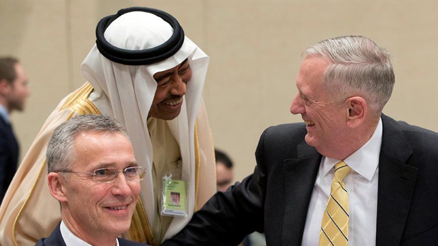 Saudi Arabia's Deputy Defense Minister Mohammed Al-Ayesh meets U.S. Defense Secretary Jim Mattis (R) next to NATO Secretary-General Jens Stoltenberg (L) during a meeting at the Alliance headquarters in Brussels, Belgium, February 15, 2017. REUTERS/Virginia Mayo/Pool - RTSYZVU