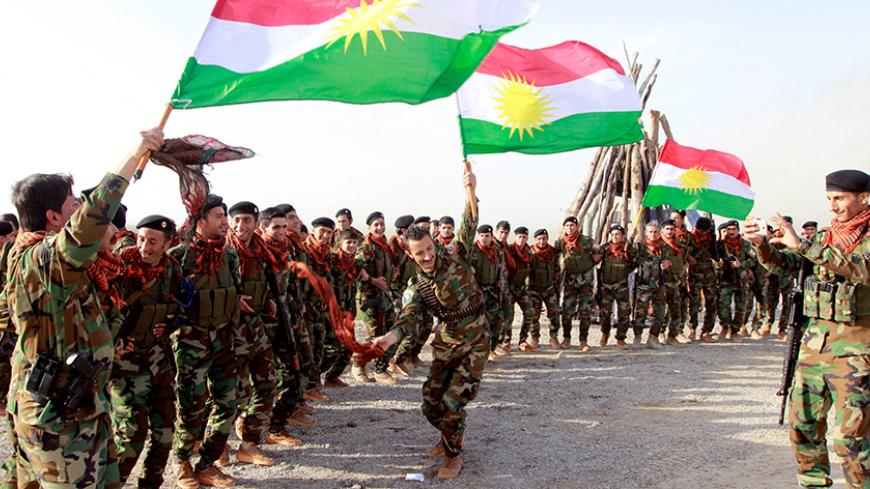 Kurdish Peshmerga forces celebrate Newroz Day, a festival marking spring and the new year, in Kirkuk March 20, 2017. REUTERS/Ako Rasheed - RTX31W8R