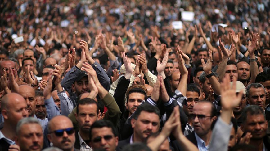 Palestinian Authority employees take part in a protest against what they say are deductions on their salaries, in Gaza City April 8, 2017. REUTERS/Mohammed Salem - RTX34ONZ