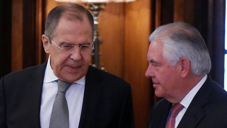 Russian Foreign Minister Sergei Lavrov and U.S. Secretary of State Rex Tillerson enter a hall during their meeting in Moscow, Russia, April 12, 2017.  REUTERS/Maxim Shemetov     TPX IMAGES OF THE DAY - RTX356VZ