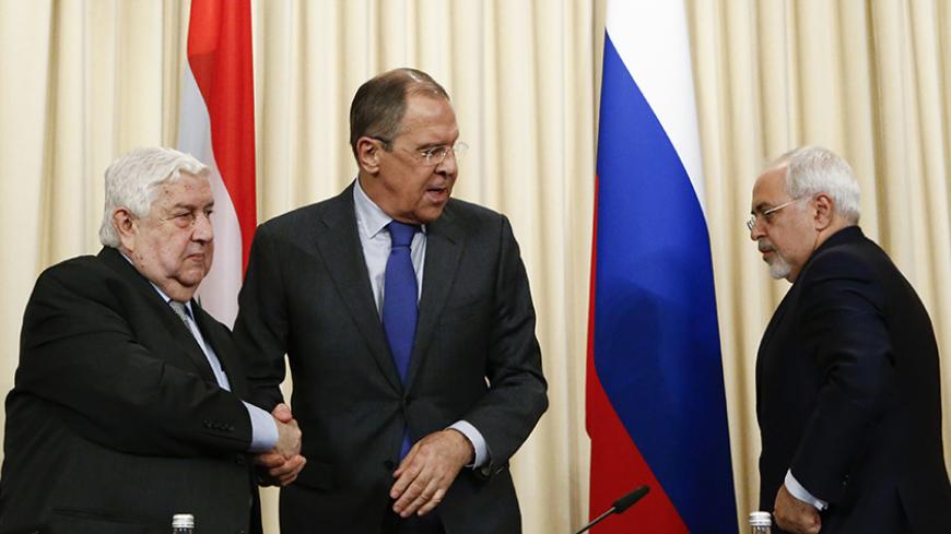 Foreign Ministers, Sergei Lavrov (C) of Russia, Walid al-Muallem (L) of Syria and Mohammad Javad Zarif of Iran, attend a news conference in Moscow, Russia, April 14, 2017. REUTERS/Sergei Karpukhin - RTX35J4R