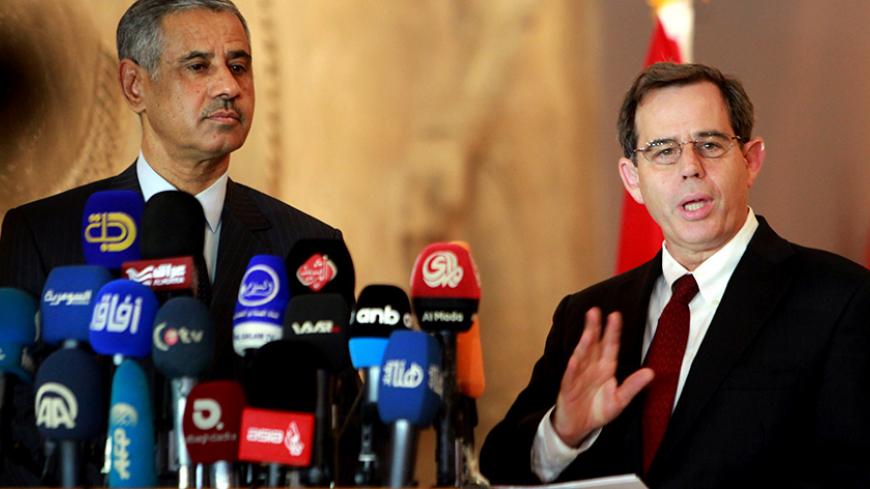 US ambassador to Iraq Stuart E. Jones (R) delivers a speech in the presence of Iraqi Minister of Tourism and Antiquities, Adel Fahad Shershab, at Iraq's National Museum during a ceremony where looted artefacts recovered by the US military during a recent raid in Syria are handed back to the Iraqi authorities, in the capital Baghdad, on July 15, 2015. AFP PHOTO / SABAH ARAR.
        (Photo credit should read SABAH ARAR/AFP/Getty Images)