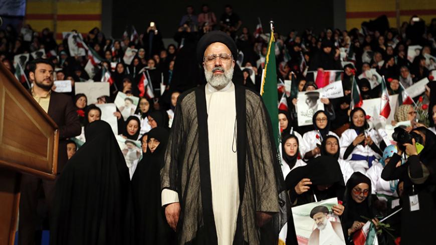 Iranian presidential candidate Ebrahim Raisi attends a campaign rally in the capital Tehran on April 29, 2017. / AFP PHOTO / ATTA KENARE        (Photo credit should read ATTA KENARE/AFP/Getty Images)