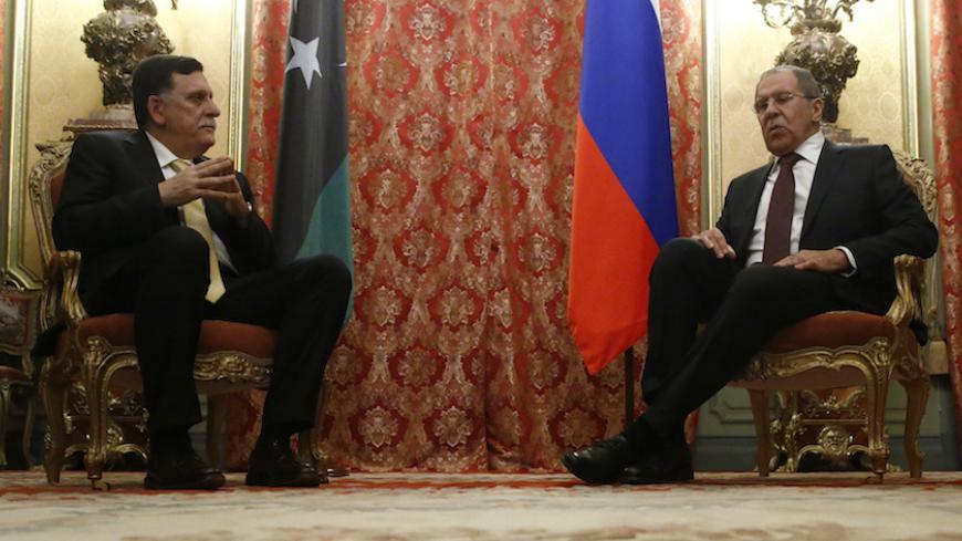 Russian Foreign Minister Sergei Lavrov (R) meets with Libyan Prime Minister Fayez Seraj in Moscow, Russia, March 2, 2017. REUTERS/Sergei Karpukhin - RTS115AB