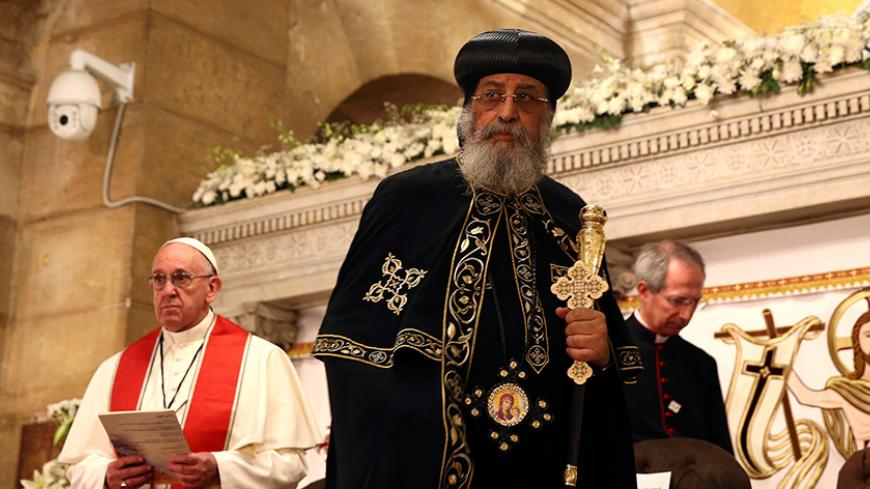 Pope Francis attends near Pope Tawadros II at the Coptic St. Peter and St. Paul's Church in Cairo, Egypt April 28, 2017.  REUTERS/Alessandro Bianchi - RTS14DZI
