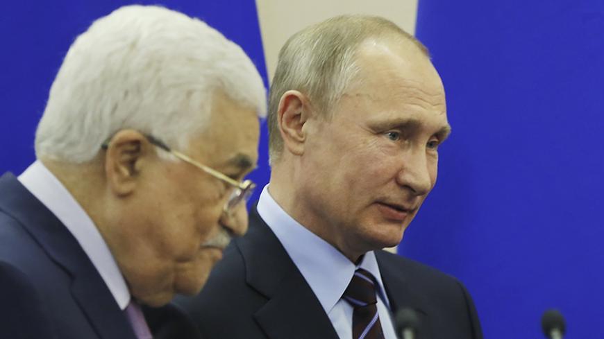 Russian President Vladimir Putin and Palestinian President Mahmoud Abbas make a statement following their meeting at the Bocharov Ruchei state residence in Sochi, Russia, May 11, 2017. REUTERS/Yuri Kochetkov/Pool - RTS167R7