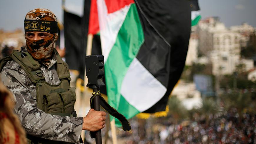 Palestinians attend a rally marking the 29th anniversary of the foundation of the Islamic Jihad movement in Gaza City October 21, 2016.   REUTERS/Suhaib Salem - RTX2PVA3