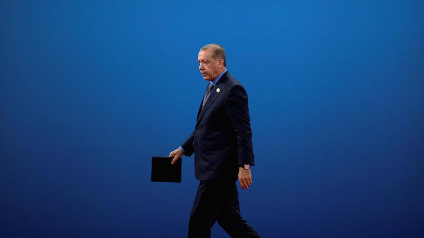 Turkey's President Tayyip Erdogan leaves the stage after speaking during the opening ceremony of the Belt and Road Forum at the China National Convention Center (CNCC) in Beijing, May 14, 2017. REUTERS/Mark Schiefelbein/Pool - RTX35Q7O