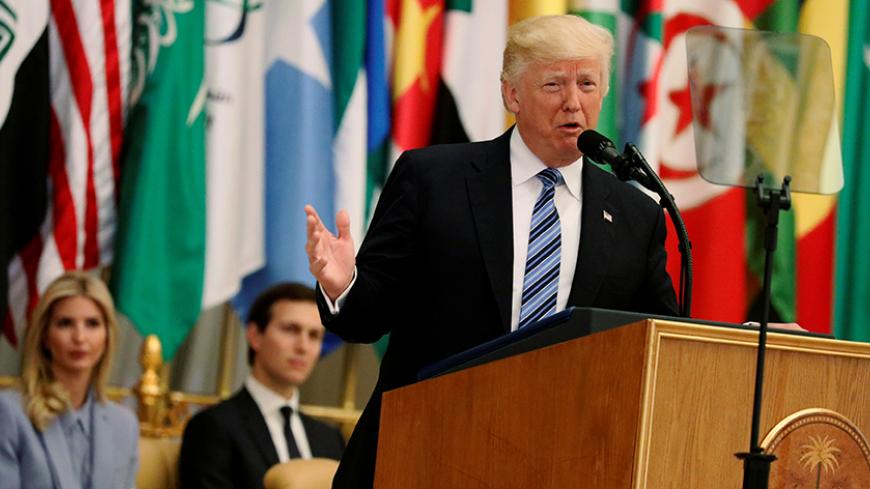 U.S. President Donald Trump, flanked by Ivanka Trump and White House senior advisor Jared Kushner, delivers remarks to the Arab Islamic American Summit in Riyadh, Saudi Arabia May 21, 2017. REUTERS/Jonathan Ernst - RTX36VDD