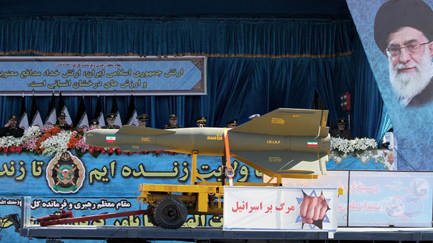 An Iranian military truck carries a smart bomb during a parade on the occasion of the country's Army Day, on April 18, 2017, in Tehran. / AFP PHOTO / ATTA KENARE        (Photo credit should read ATTA KENARE/AFP/Getty Images)