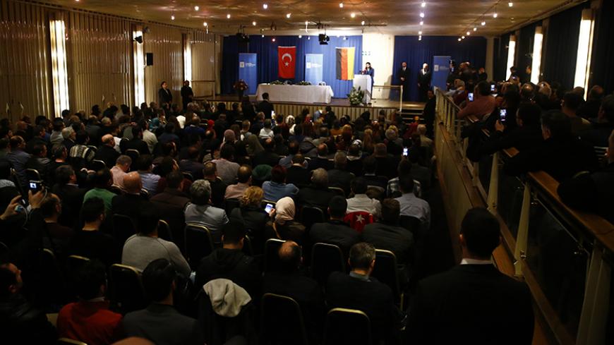 A general view shows the audience before a speech of Turkish Economy Minister Nihat Zeybekci in Cologne, Germany, March 5, 2017. REUTERS/Wolfgang Rattay - RTS11JXA