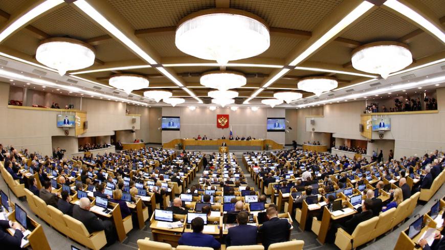 Lawmakers listen to a speech by Russian Prime Minister Dmitry Medvedev during a session at the State Duma, the lower house of parliament, in Moscow, Russia April 19, 2017. REUTERS/Sergei Karpukhin - RTS12Y6L