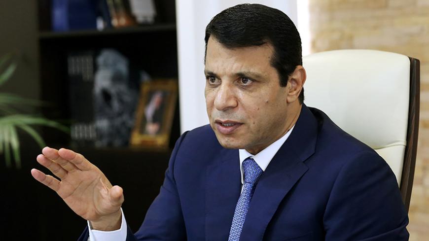 Mohammed Dahlan, a former Fatah security chief, gestures in his office in Abu Dhabi, United Arab Emirates October 18, 2016. Picture taken October 18, 2016. REUTERS/Stringer - RTX2QI8I