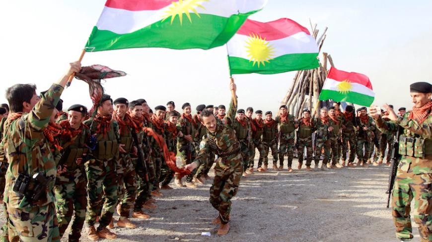 Kurdish Peshmerga forces celebrate Newroz Day, a festival marking spring and the new year, in Kirkuk March 20, 2017. REUTERS/Ako Rasheed - RTX31W8R
