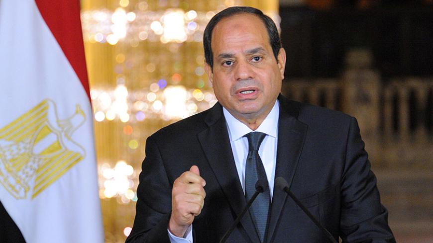 Egyptian President Abdel Fattah al-Sisi gives an address after the gunmen attack in Minya, accompanied by leaders of the Supreme Council of the Armed Forces and the Supreme Council for Police (unseen), at the Ittihadiya presidential palace in Cairo, Egypt, May 26, 2017 in this handout picture courtesy of the Egyptian Presidency. The Egyptian Presidency/Handout via REUTERS ATTENTION EDITORS - THIS IMAGE WAS PROVIDED BY A THIRD PARTY. EDITORIAL USE ONLY. TPX IMAGES OF THE DAY - RTX37T68