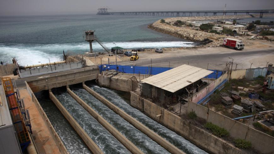 Brine water flows into the Mediterranean Sea after passing through a desalination plant in the coastal city of Hadera May 16, 2010. An Israeli consortium unveiled the world's largest reverse osmosis desalination plant on Sunday in Hadera, hoping to help alleviate the arid country's water shortage.   REUTERS/Nir Elias (ISRAEL - Tags: ENVIRONMENT POLITICS BUSINESS) - RTR2DYHU