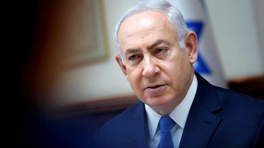 Israeli Prime Minister Benjamin Netanyahu chairs the weekly cabinet meeting in Jerusalem July 3, 2017. REUTERS/Thomas Coex/Pool - RTS19JBA