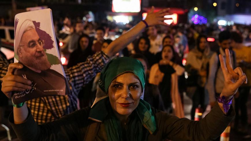 Supporters of Iranian president Hassan Rouhani celebrate his victory in the presidential election in Tehran, Iran, May 20, 2017. TIMA via REUTERS ATTENTION EDITORS - THIS IMAGE WAS PROVIDED BY A THIRD PARTY. FOR EDITORIAL USE ONLY.      TPX IMAGES OF THE DAY - RTX36RDN