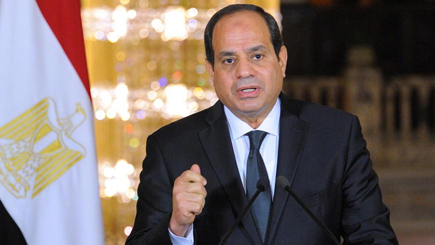 Egyptian President Abdel Fattah al-Sisi gives an address after the gunmen attack in Minya, accompanied by leaders of the Supreme Council of the Armed Forces and the Supreme Council for Police (unseen), at the Ittihadiya presidential palace in Cairo, Egypt, May 26, 2017 in this handout picture courtesy of the Egyptian Presidency. The Egyptian Presidency/Handout via REUTERS ATTENTION EDITORS - THIS IMAGE WAS PROVIDED BY A THIRD PARTY. EDITORIAL USE ONLY. TPX IMAGES OF THE DAY - RTX37T68