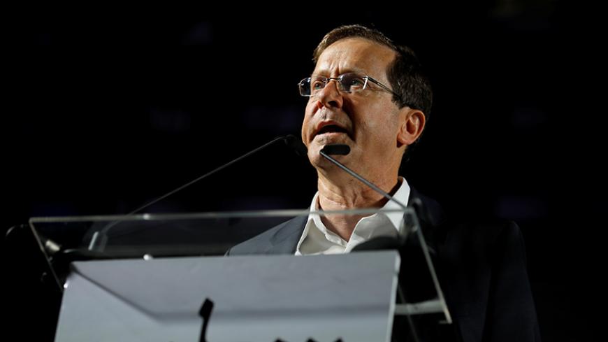 Israeli opposition leader Isaac Herzog, speaks during a demonstration held by Israeli left-wing group Peace Now, entitled "Two States, One Hope, A demonstration against 50 years of occupation", in Tel Aviv, Israel May 27, 2017. REUTERS/Amir Cohen - RTX37WRH