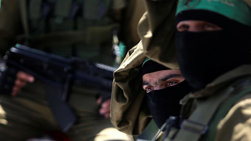 Palestinian Hamas militants attend the funeral of their comrade Ibraheem Abu Al-Naja in Rafah, southern Gaza Strip June 8, 2017. REUTERS/Ibraheem Abu Mustafa - RTX39MDV