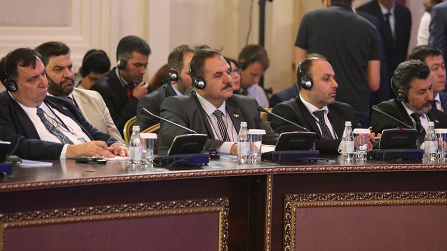 Members of the Syrian opposition delegation attend the round on Syria peace talks in Astana, Kazakhstan, July 5, 2017. REUTERS/Mukhtar Kholdorbekov - RTX3A596