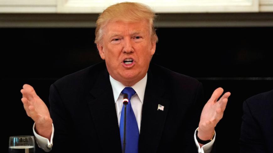 U.S. President Donald trump speaks during a lunch meeting with Senate Republicans to discuss healthcare at the White House in Washington, U.S., July 19, 2017.  REUTERS/Kevin Lamarque - RTX3C3ZR